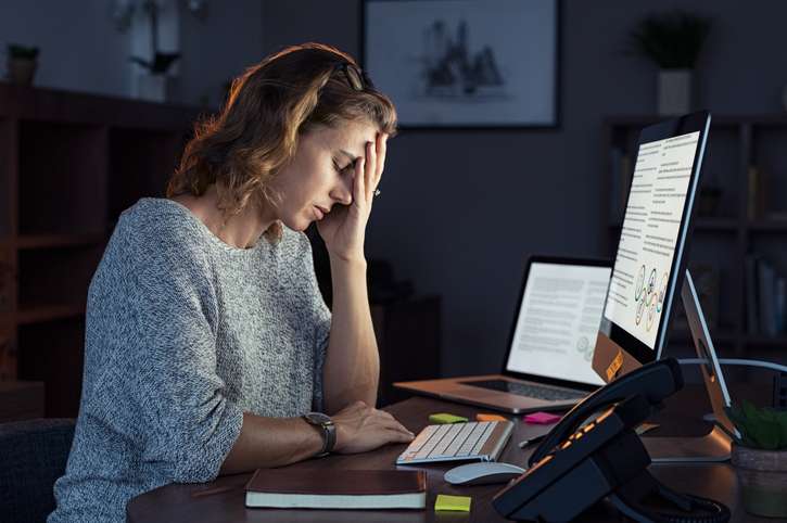 business woman in need of burnout recovery plan