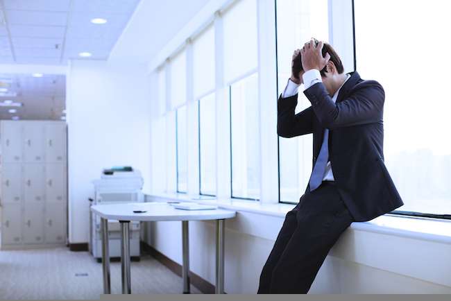 businessman who needs a burnout recovery plan