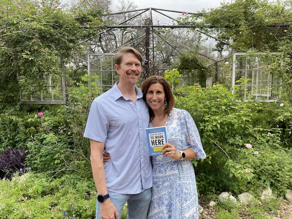 Maura and Shawn Thomas. Maura holds her newest book, Everyone Wants To Work Here