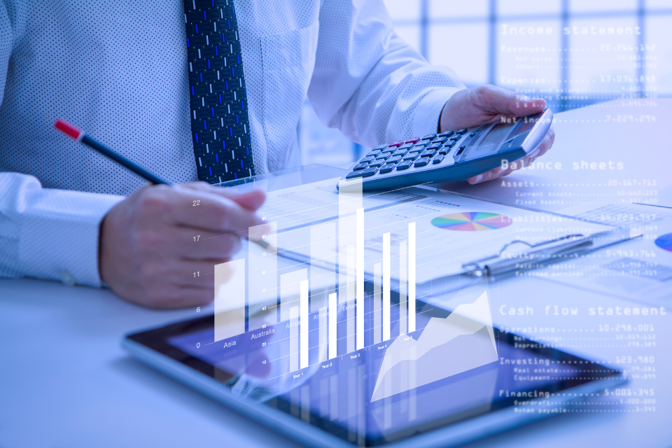A man in tie performs data analysis