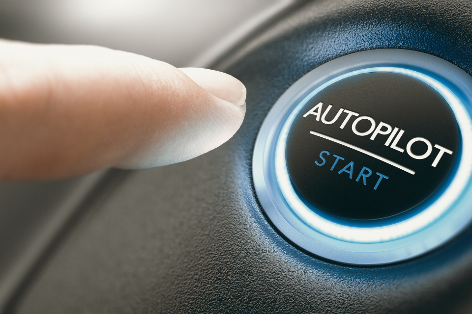 A finger presses a button that says "Autopilot Start"