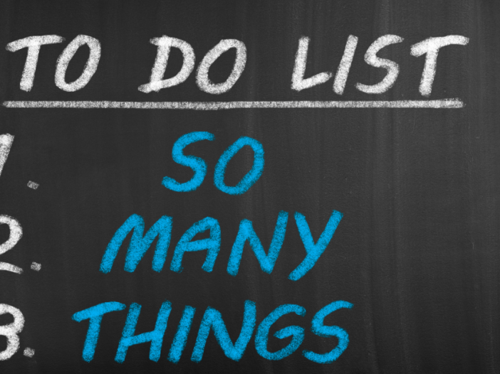 On a chalkboard are the words "To Do List 1. So 2. Many 3. Things"