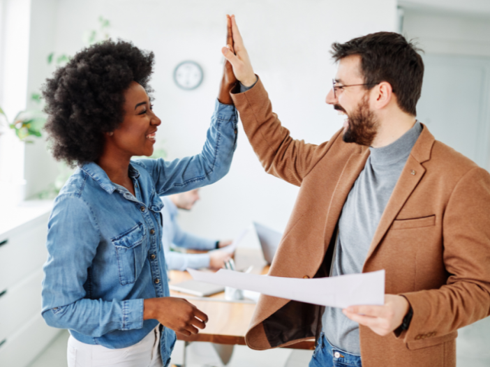 workers high-five