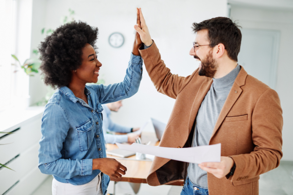 workers high-five